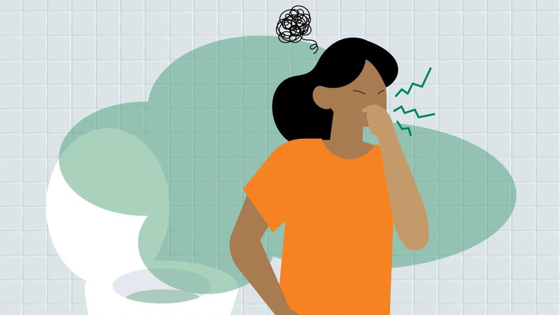 Person holding their nose, with toilet and smelly haze in the backgrond