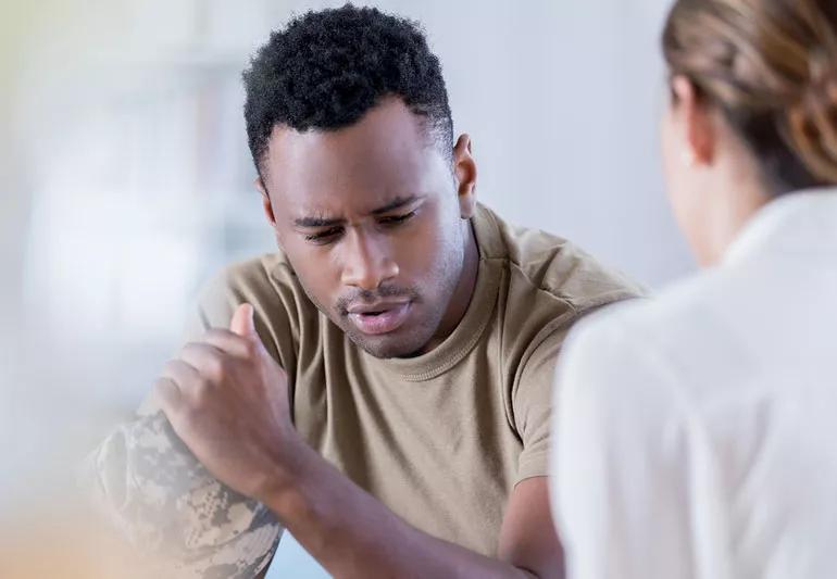 Man talking to therapist