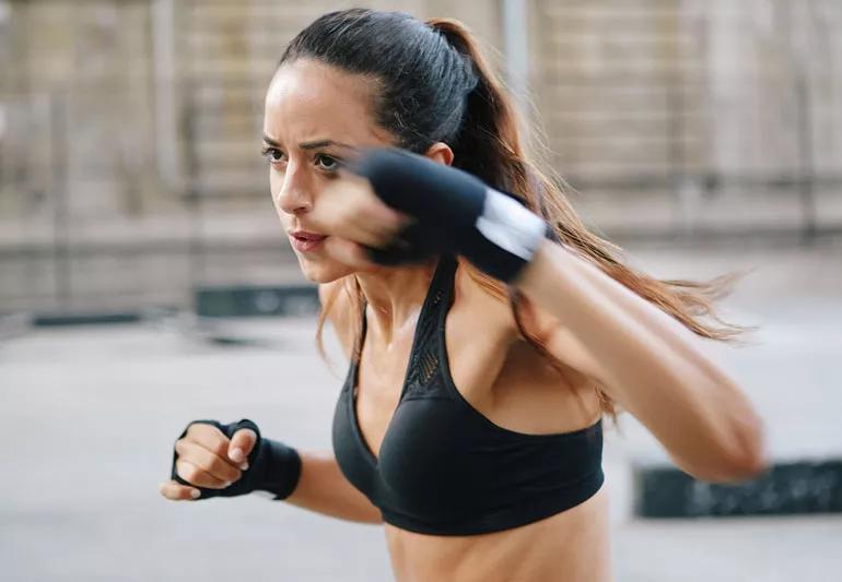 woman exercising strenuously