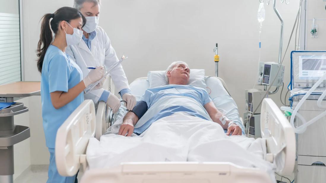 patient's blood pressure being checked