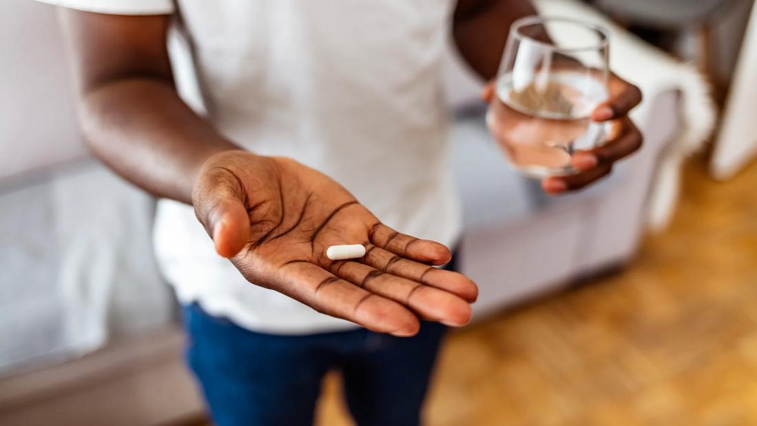 Man taking medication