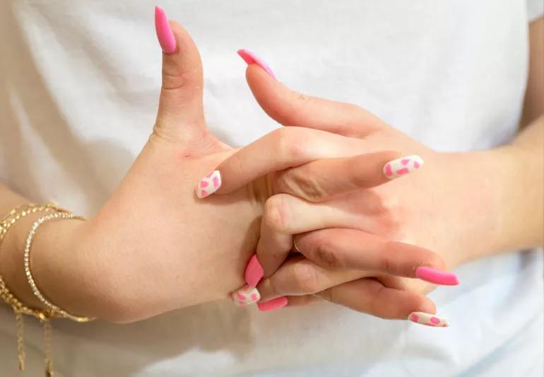 girl cracking her knuckles