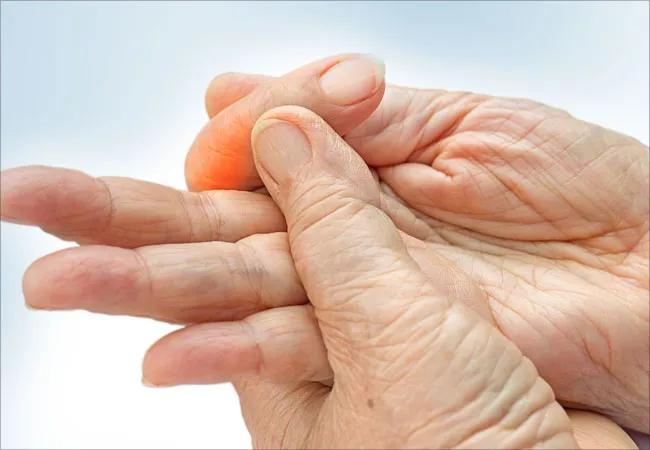 Set of hands, with opposite thumb touching ring finger in distress.