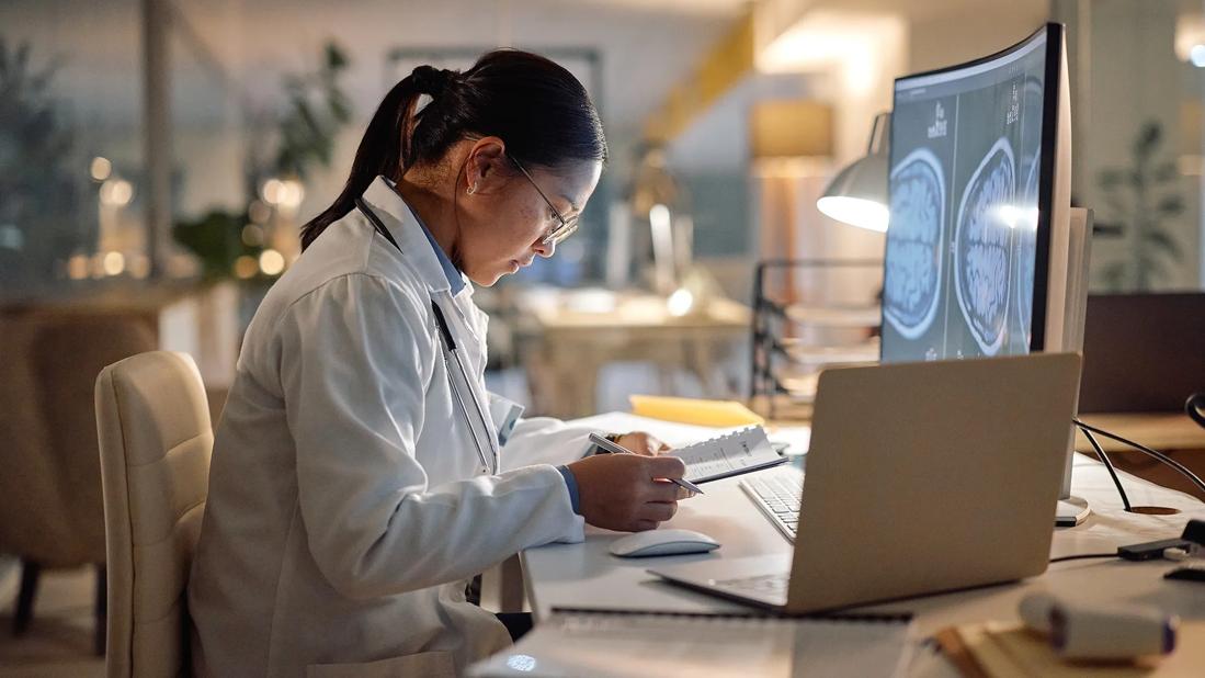 Nurse researcher at desk