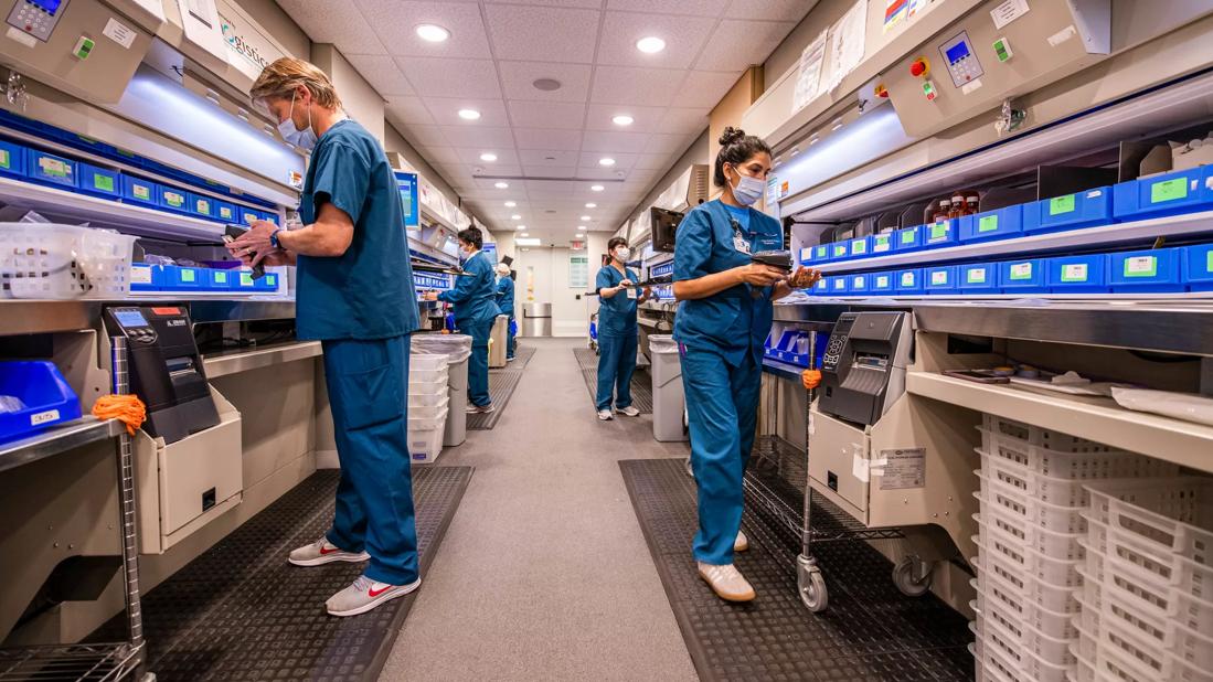 Caregivers rounding on a hospital unit