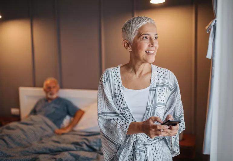 Elderly couple in bedroom