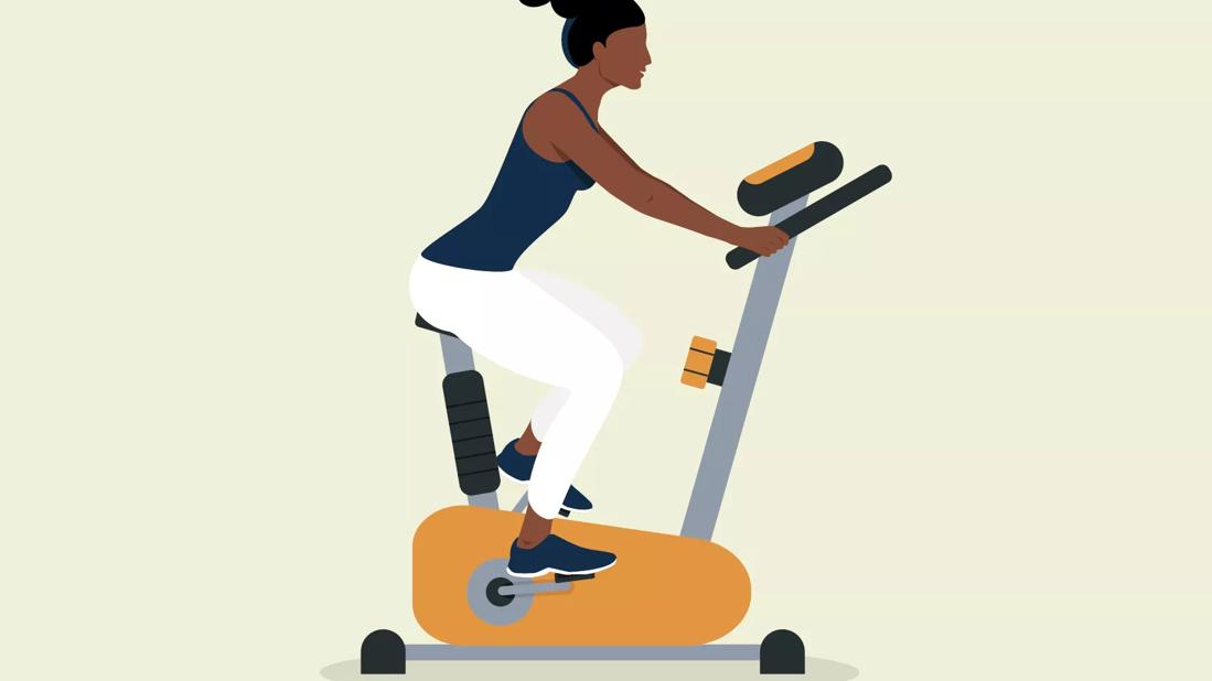 A person working out on a spin bike