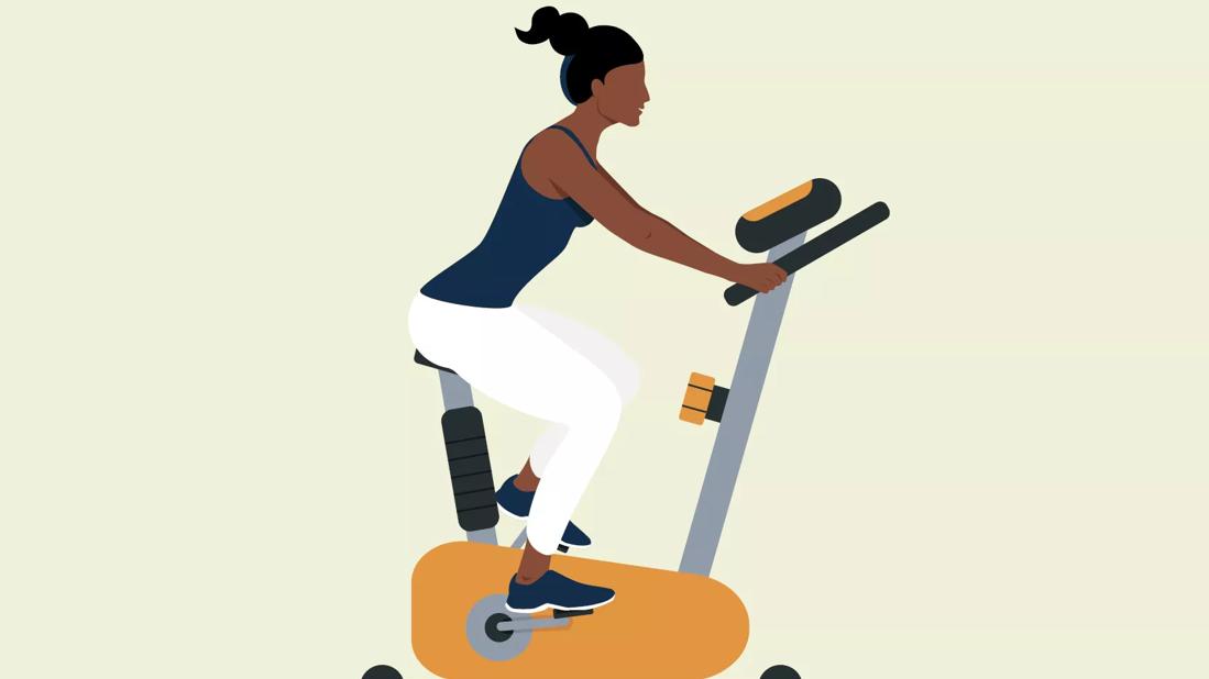 A person working out on a spin bike