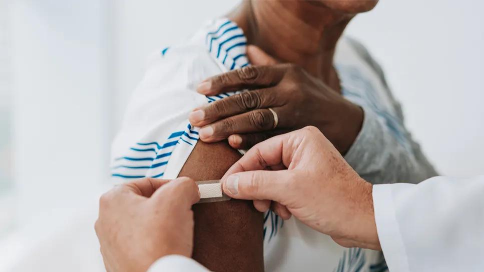 Elderly patient receiving shot