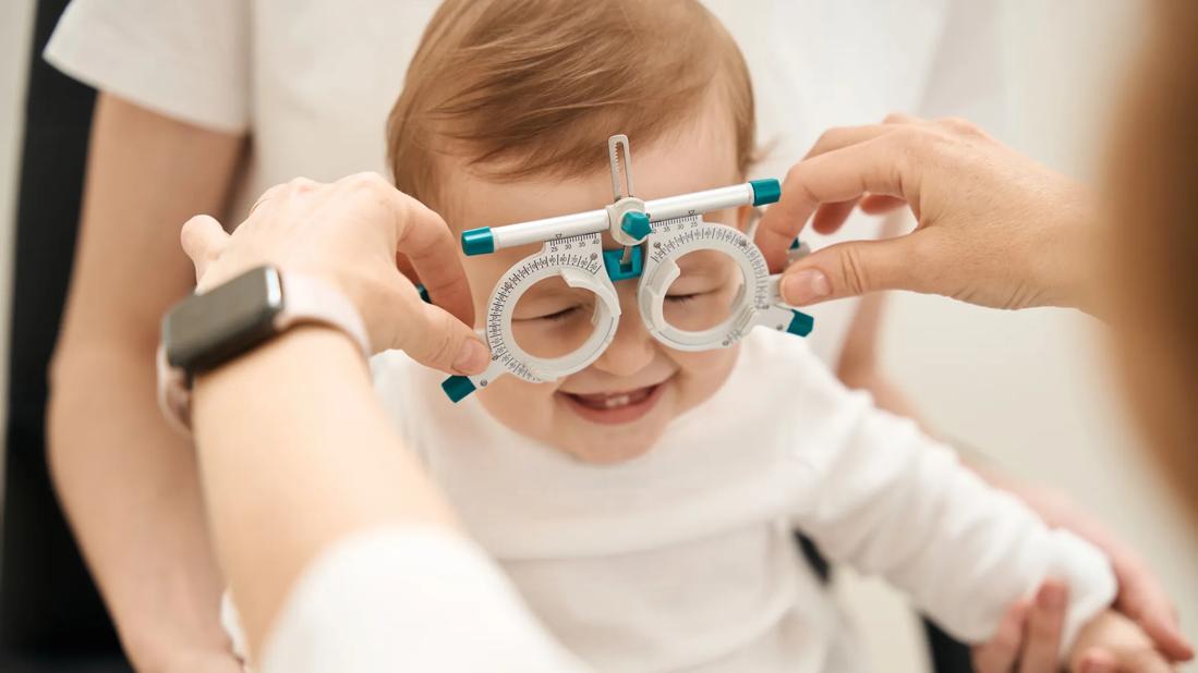 Young toddler having an eye examine