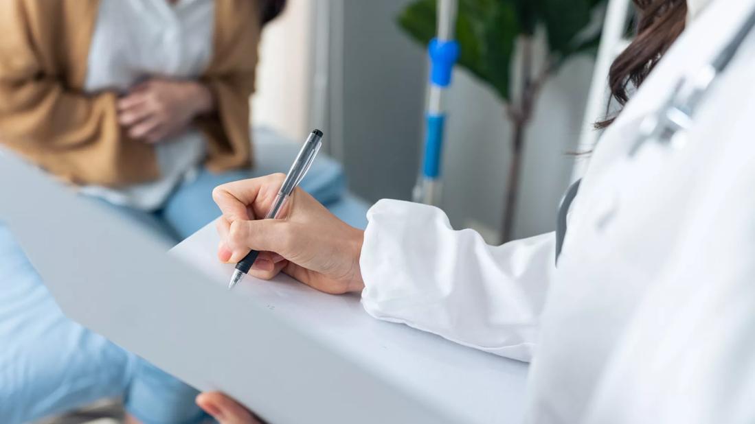 Doctor talking with patient