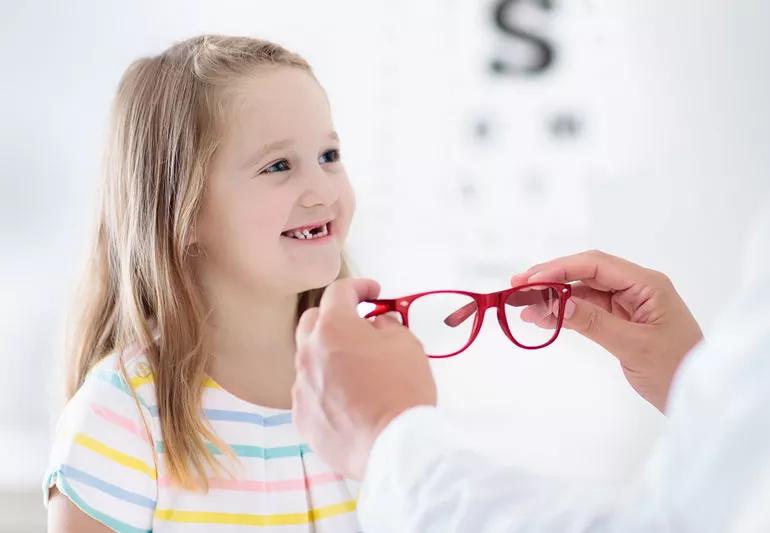 Child having eye exam at optomentrist office