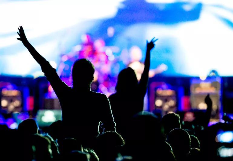 Concert stage seen from the engaged audience's point of view.