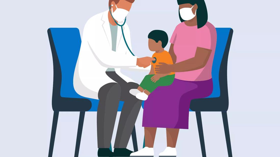 Doctor checking child's vital signs.