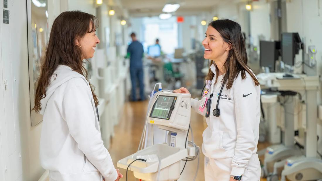 Nurses talking in hallway