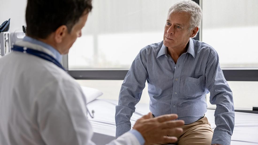 Physician speaking with patient