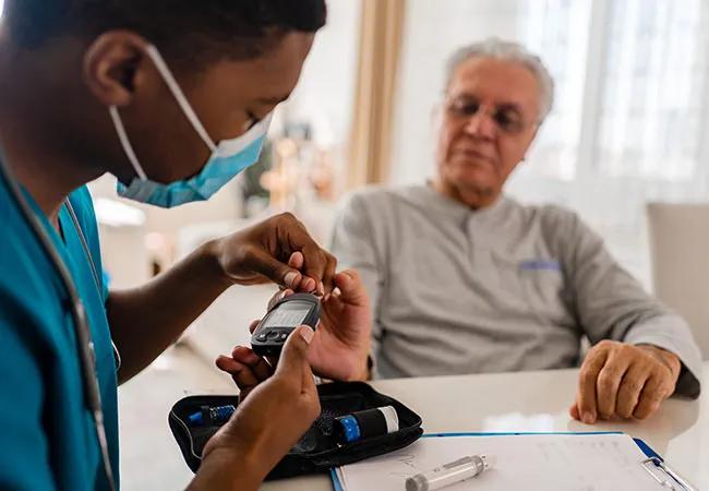 Nurse with diabetic patient