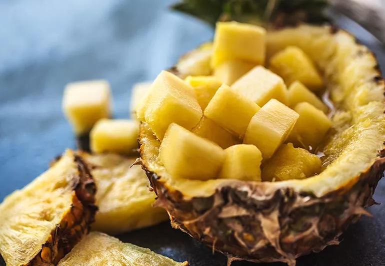 A close up image of diced pinapple slices