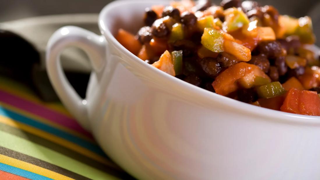 Crock of creole black beans and tomatoes