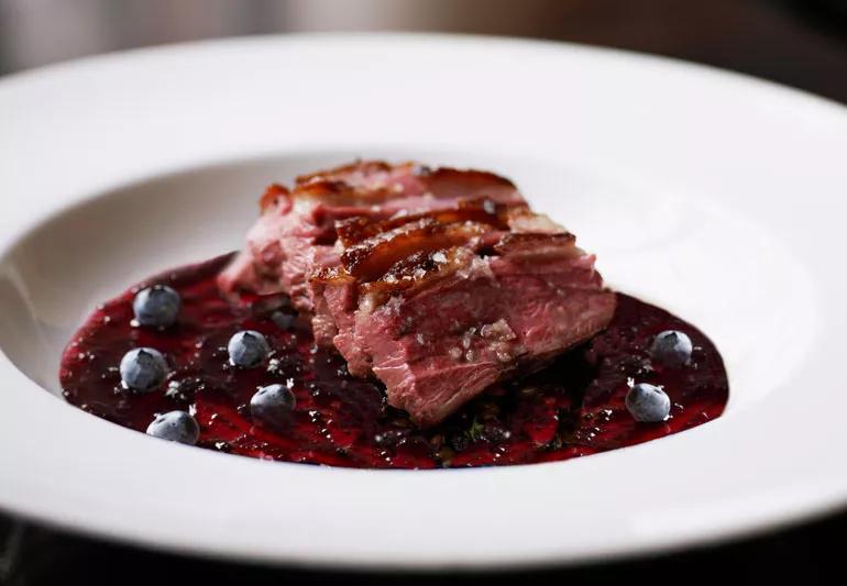 Roasted duck with blueberry sauce