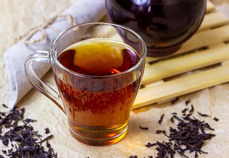 A mug of black tea.