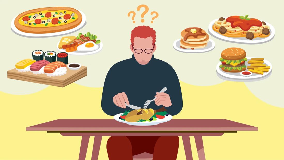 Person sitting at table eating from a plate full of food, thinking about other foods and meals floating around their head