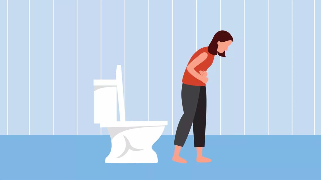 person walking away from toilet holding upset stomach