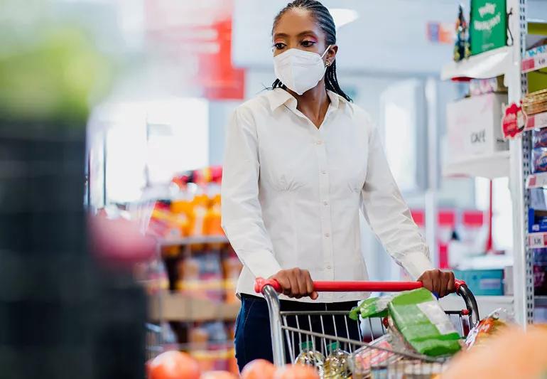 woman shopping in KN95 mask