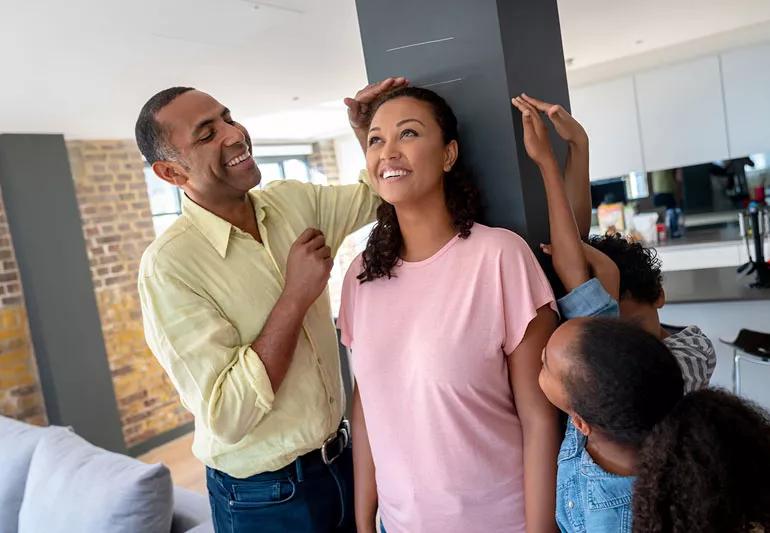 Family measures mom's height