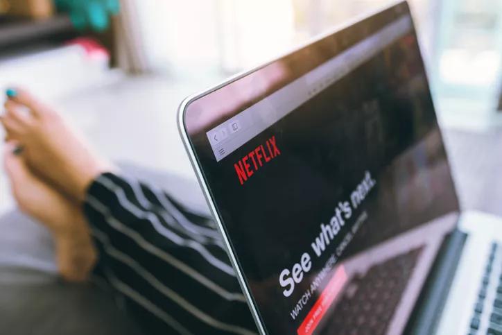 Is It Bad for You to Binge-Watch TV Shows? | Close up Netflix website in laptop screen