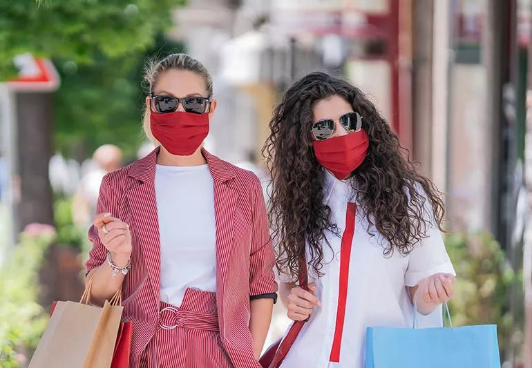 two women shopping wearing outfit coordinated face masks