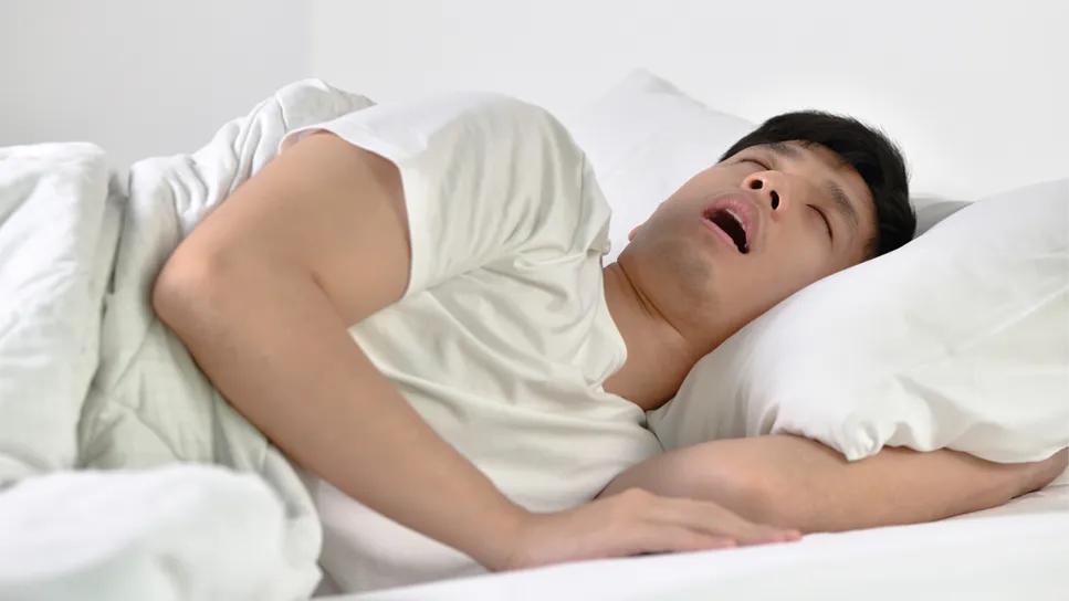 Man sleeping with mouth open