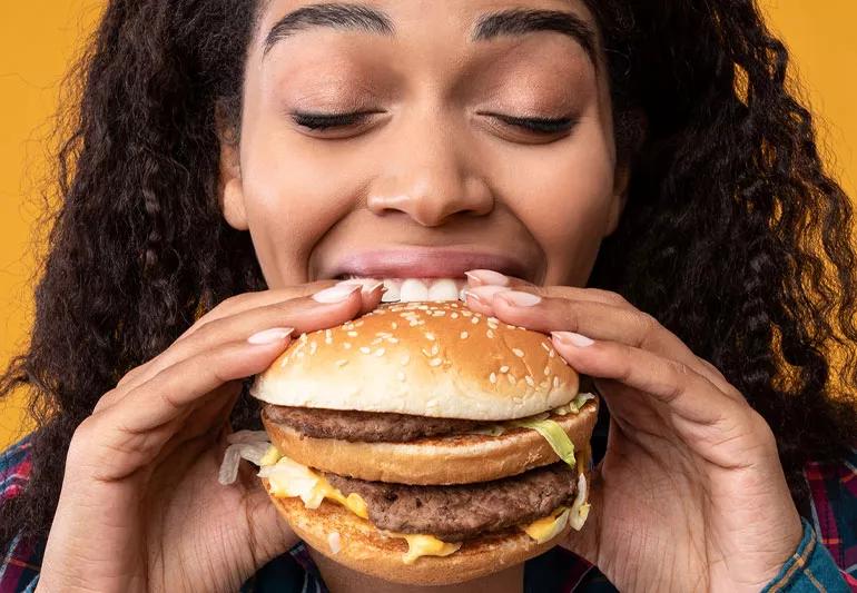 woman eating a burger