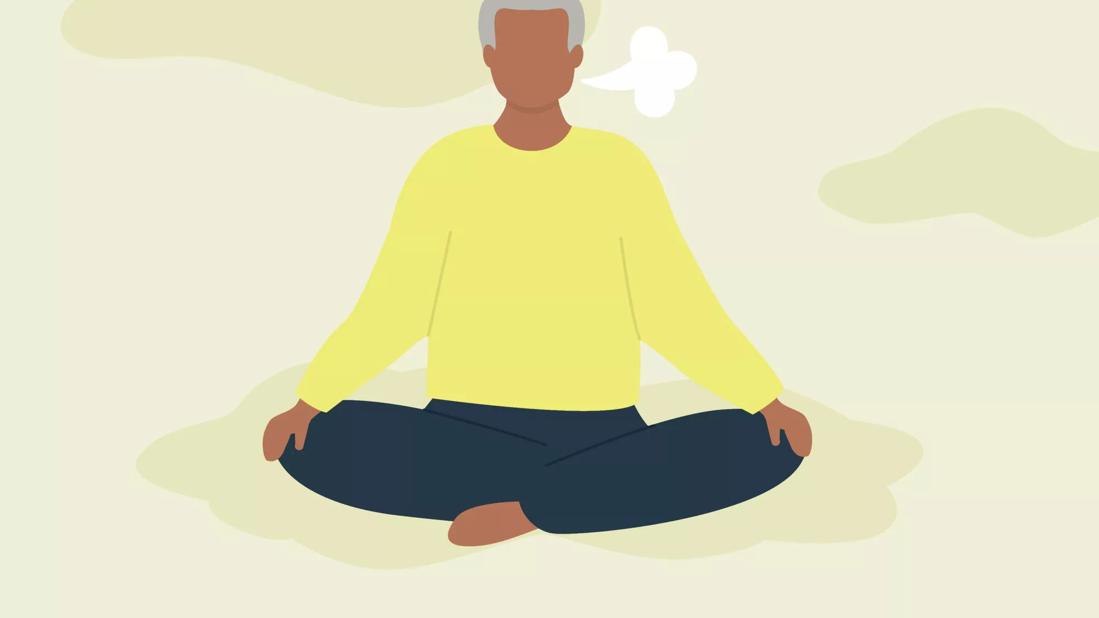 person practicing breathwork in meditative pose