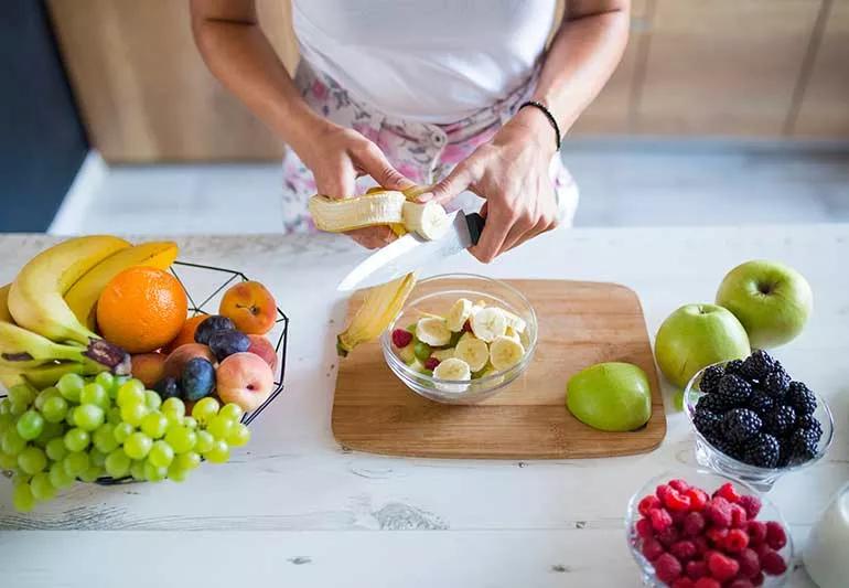 Cutting board with fruits.