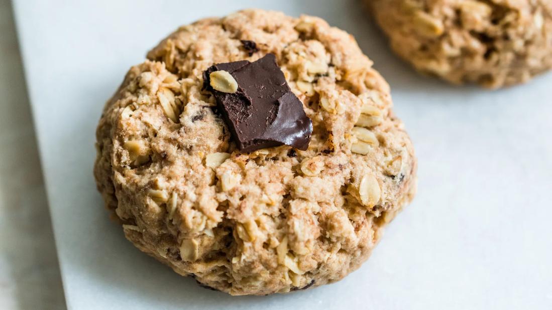 oatmeal cookies with chunk of chocolate on top