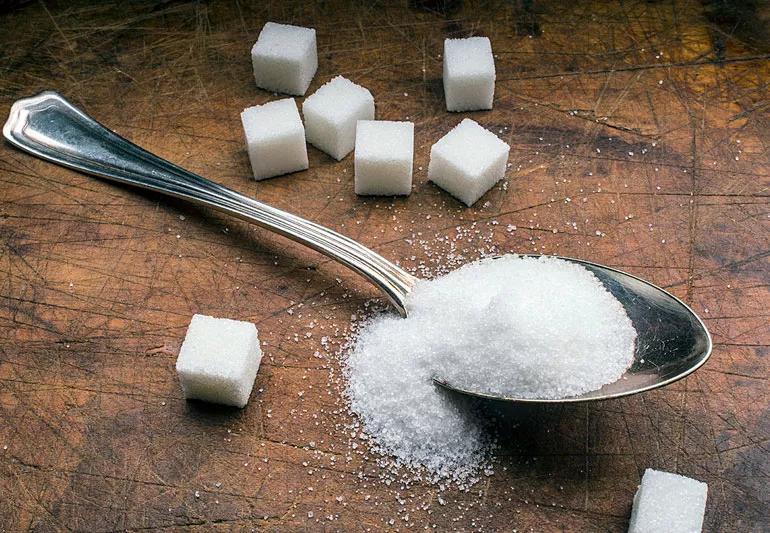 tablespoon of sugar and sugar cubes