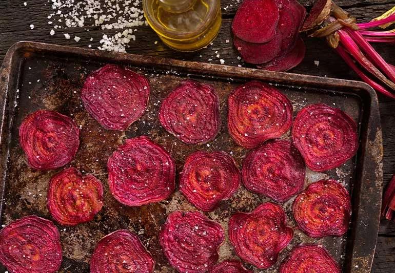 roasted beet slices on oven pan