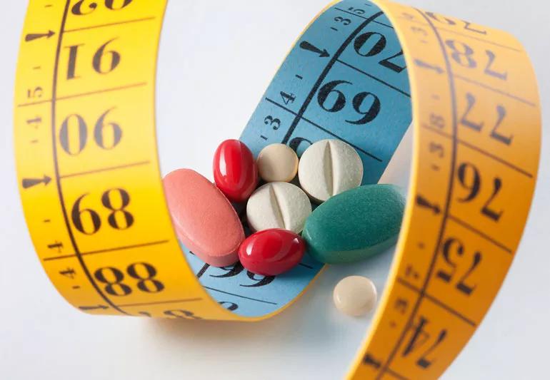 Tape measure and weight loss pills