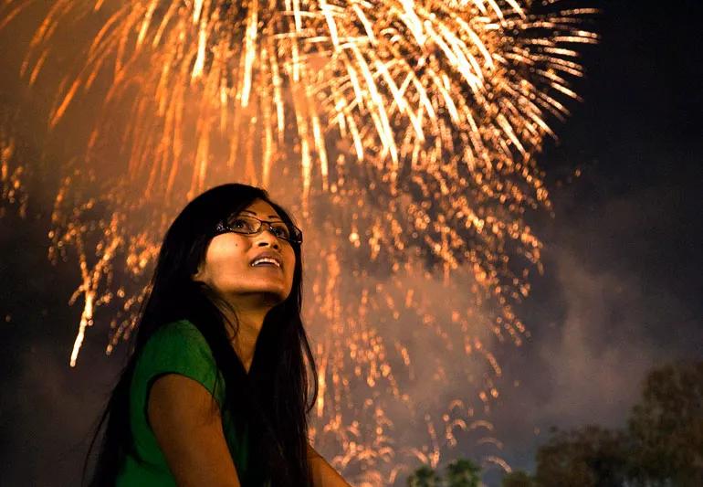 woman enjoying fireworks