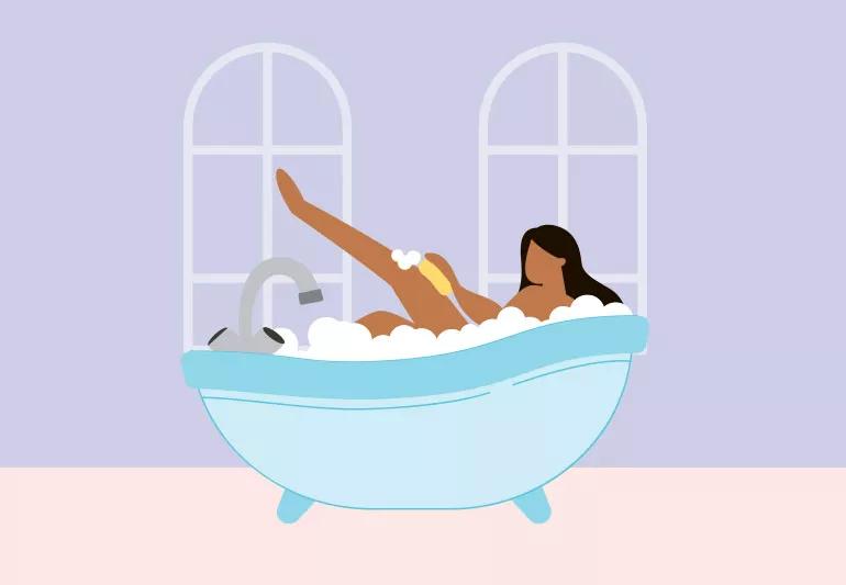 Woman relaxing and taking a bath