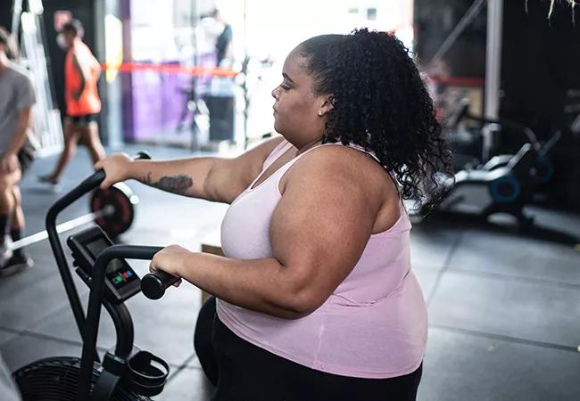 Young woman exercising in the gym