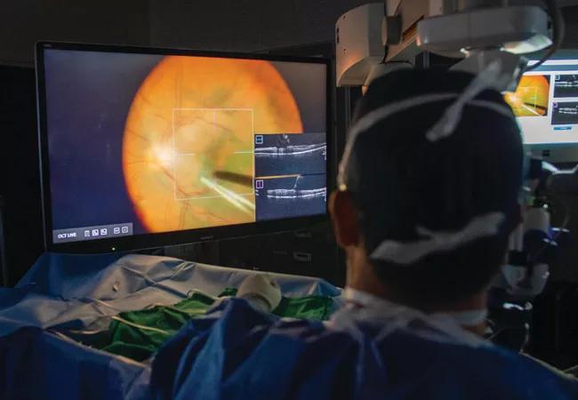 A Cleveland Clinic Cole Eye Institute ophthalmologist uses intraoperative OCT during retinal surgery.