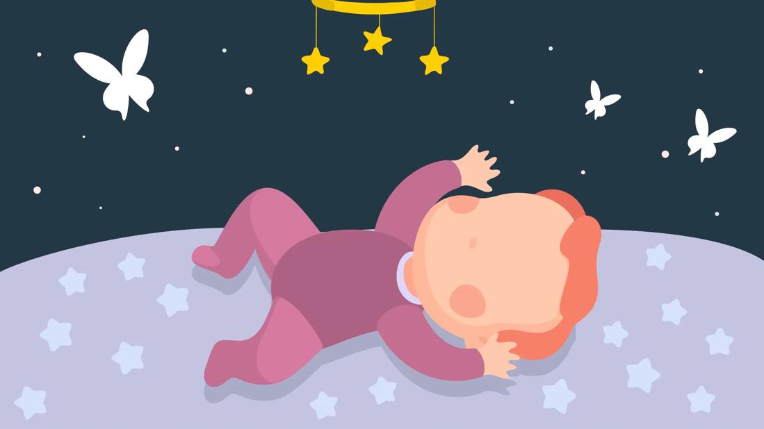 Baby sleeping on back in crib at night, with mobile