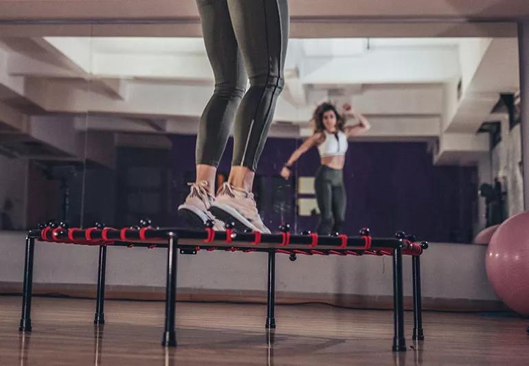 exercising on a mini trampoline