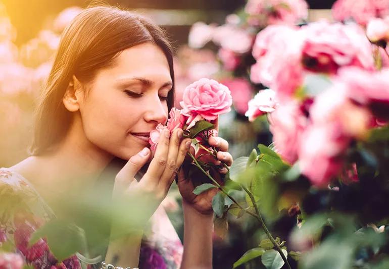 Stopping to smell the roses to have a happier outlook