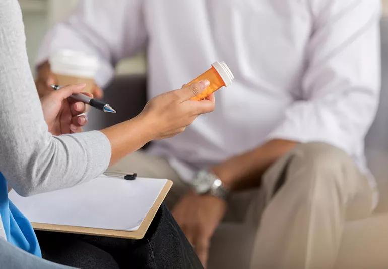 doctor prescribing anti-depressants to patient