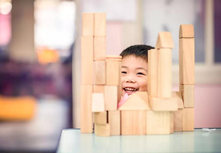 Child building with blocks