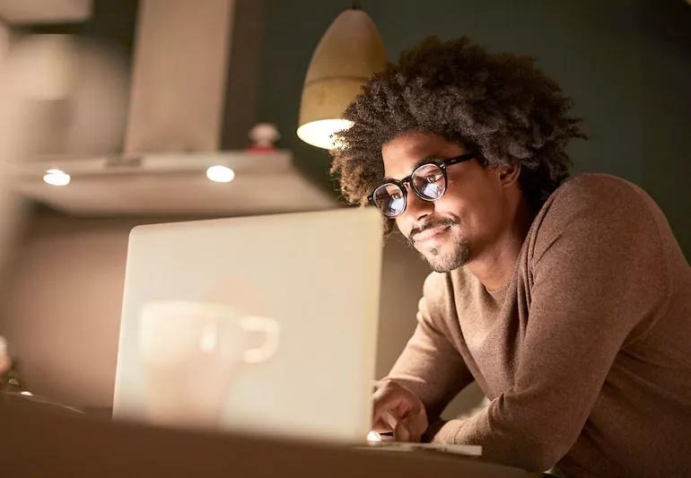 Young man working into the night