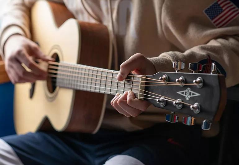 Learning how to play guitar